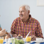 older couple eating healthy breakfast